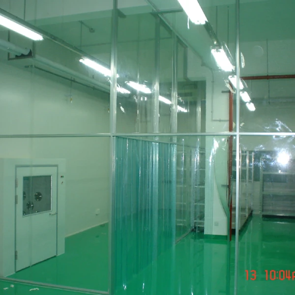 Side view of Hardwall Modular Clean Booth showing panel joints, ceiling filter bank, and integrated control panel