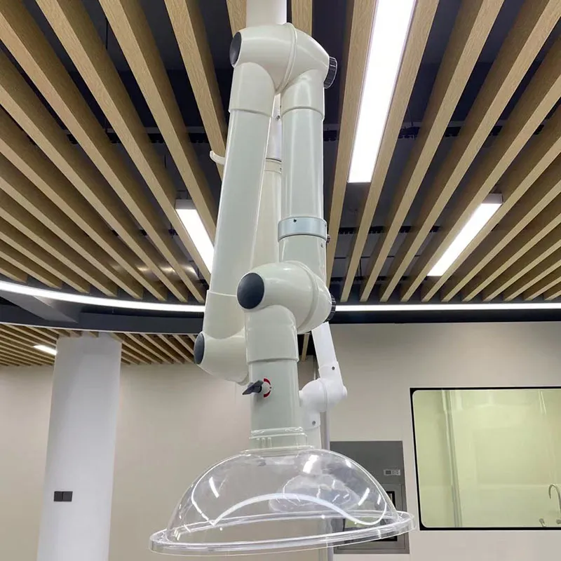Modular steel chemistry lab furniture array in a GMP-compliant biopharma QC lab, showing coordinated ceiling grid, cleanroom partition interface, and utility integration
